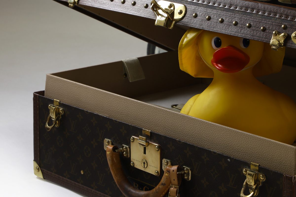 Louis Vuitton Luggage With a Tail Attached